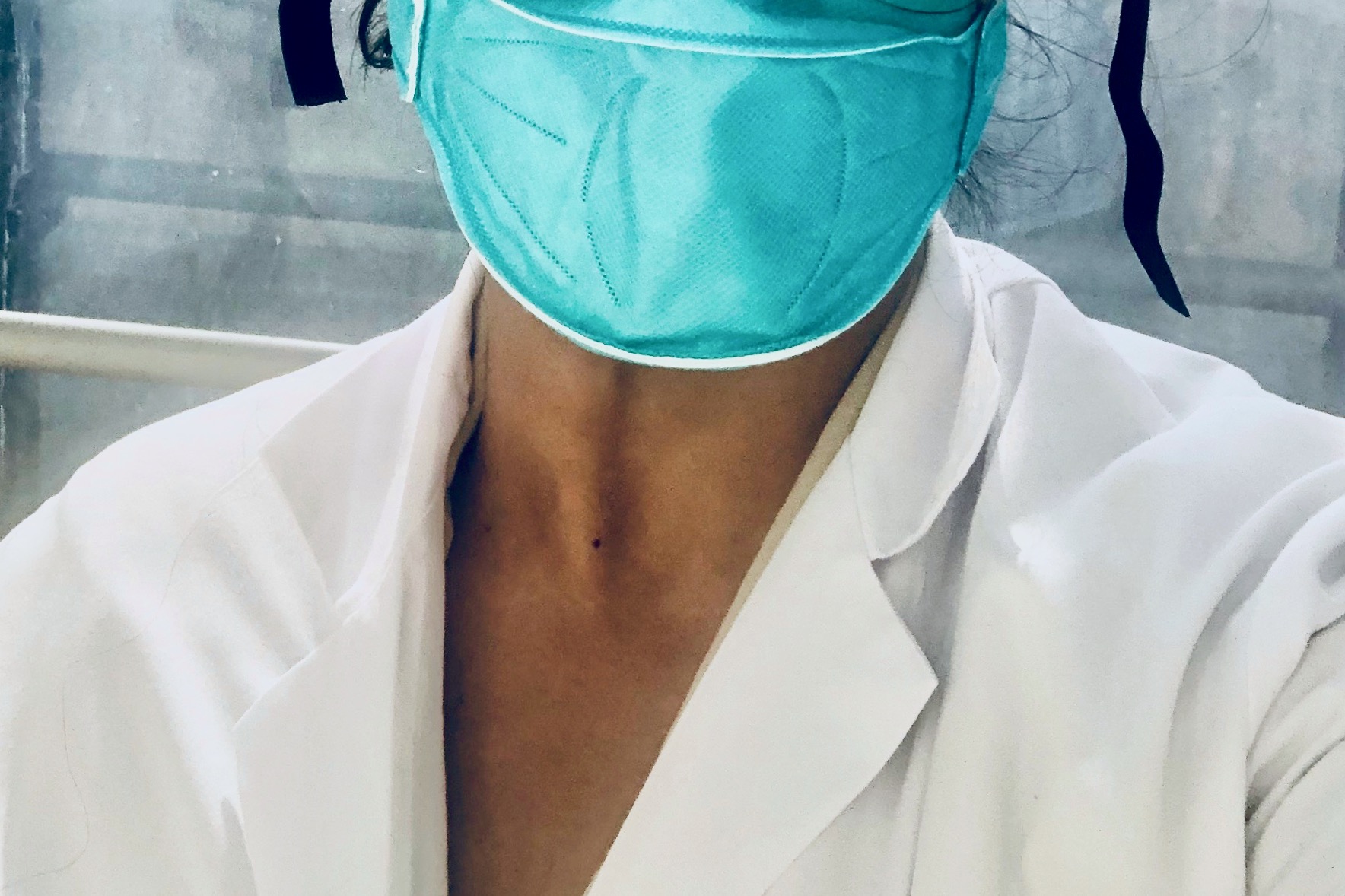 Physician wearing protective mask